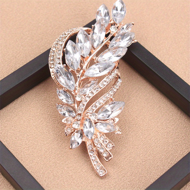 Elegant and luxurious rhinestone flower brooch, featuring an irregular faux floral design. This versatile accessory can be worn on clothing, bags, hats, and as women's fashion jewelry.