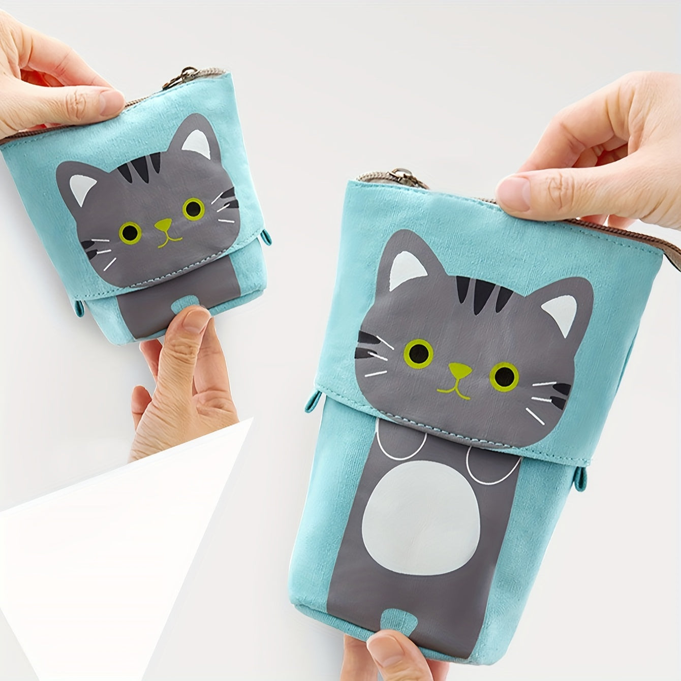 Canvas cat pencil case with zippered expandable design, 2-in-1 telescopic pouch for students.