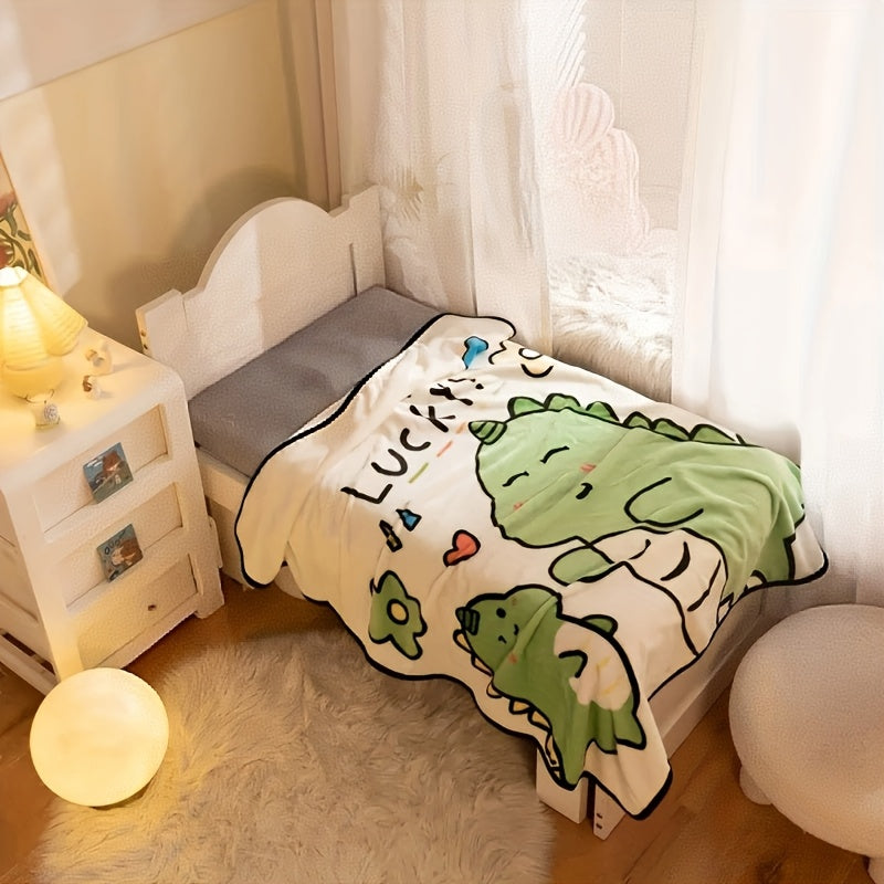 The Ultra-Soft Dinosaur Flannel Throw Blanket measuring 144.78x99.06 cm is perfect for both youngsters and adults. It is ideal for use on the couch, bed, during travel, or while camping. This blanket makes a great gift for Christmas, Halloween, or