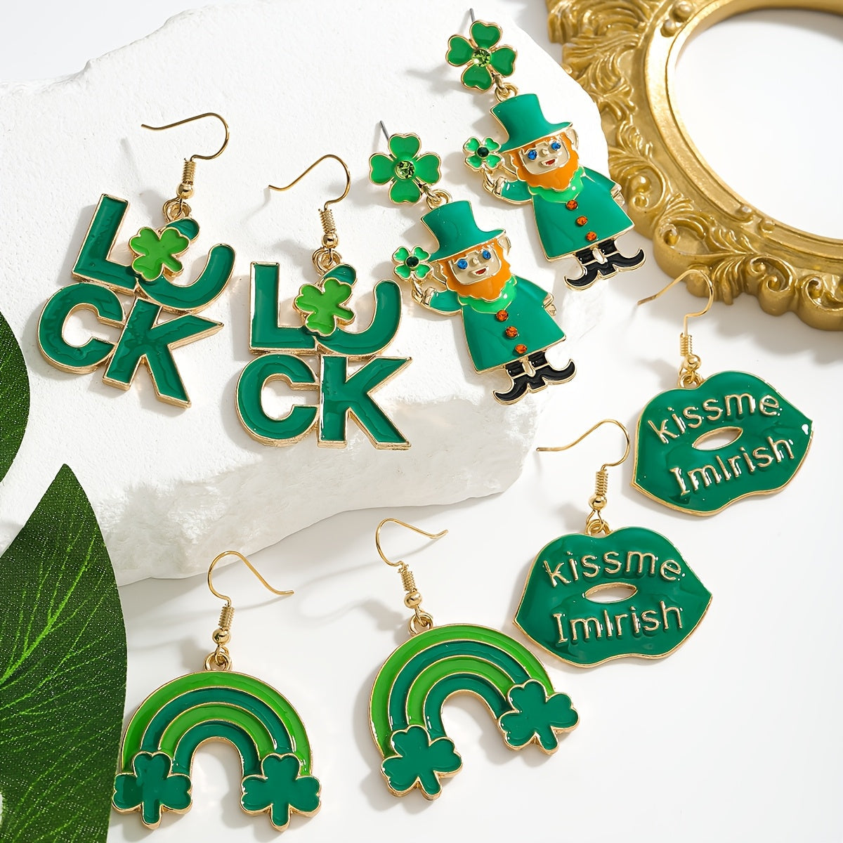 St. Patrick's Day Charm Earrings featuring a Lucky Clover and Rainbow Design adorned with Sparkling Rhinestones. Made with Stainless Steel Posts, these Earrings are crafted from Alloy, making them a Perfect Gift for Her. In Irish Green, Lip-shaped, Oil