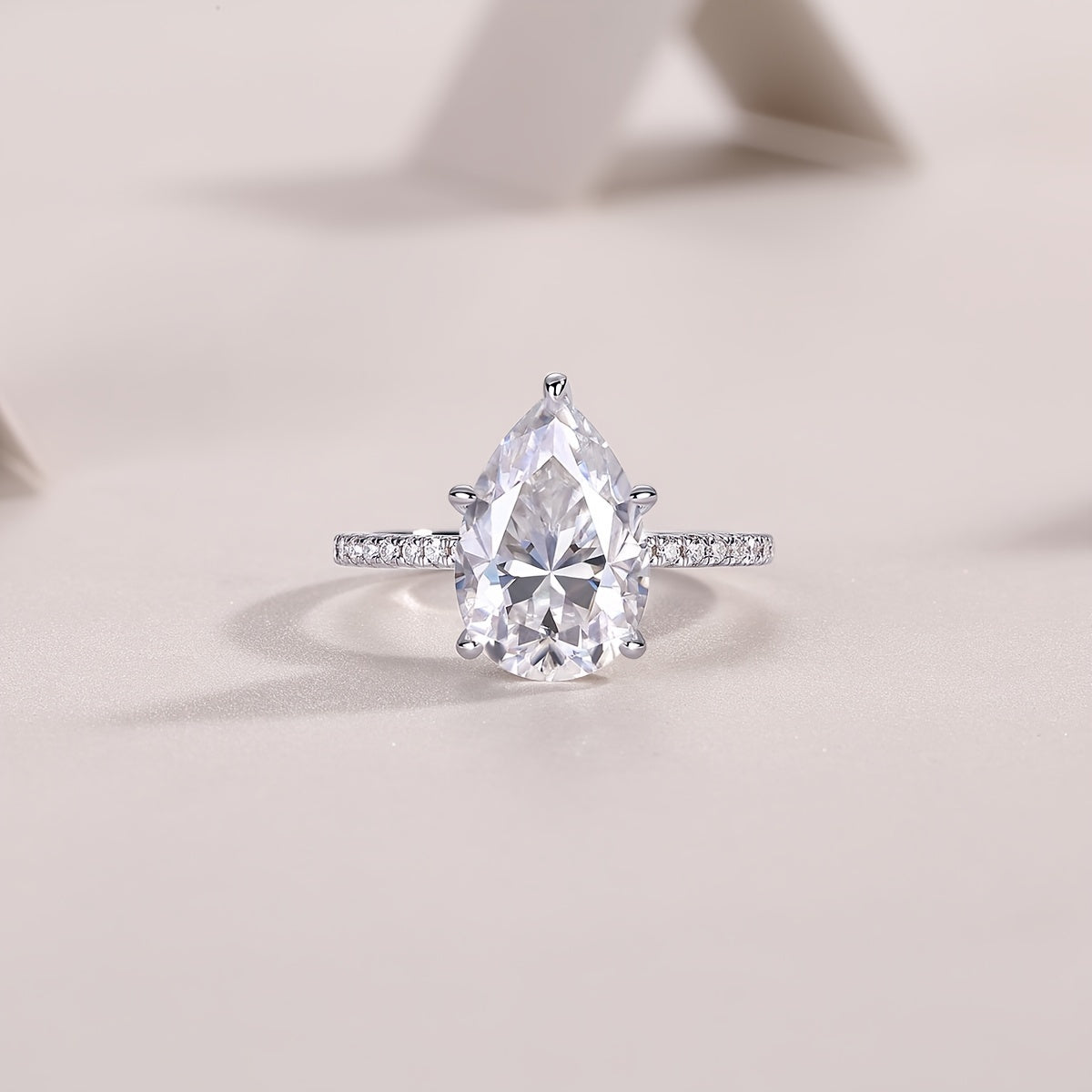 Elegantly designed JIU ZUAN Moissanite Engagement Ring, crafted from high-quality 925 Sterling Silver with a luxurious 18K Golden Plated finish, suitable for both Men and Women. Comes with a lovely gift box making it perfect for any occasion - whether