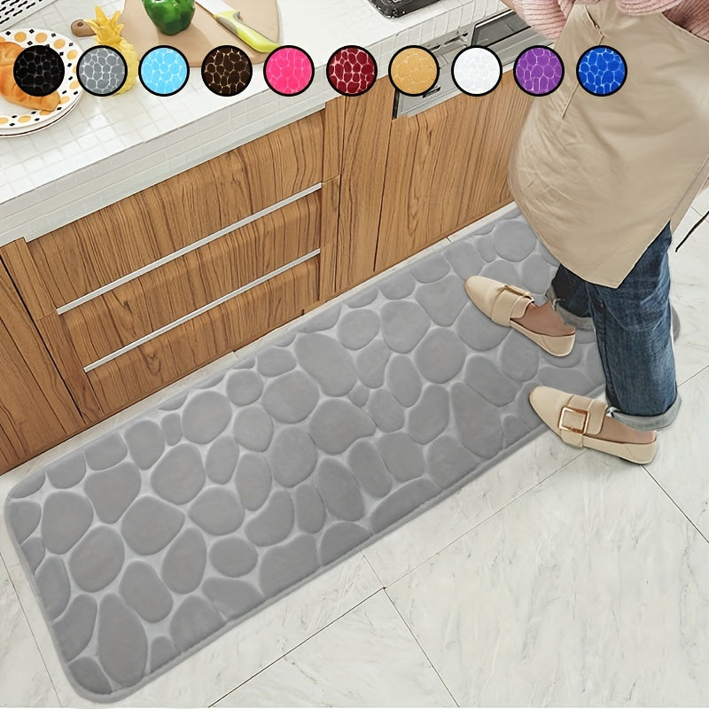 Soft, non-slip cobblestone bath rug absorbs water quickly for various indoor uses.