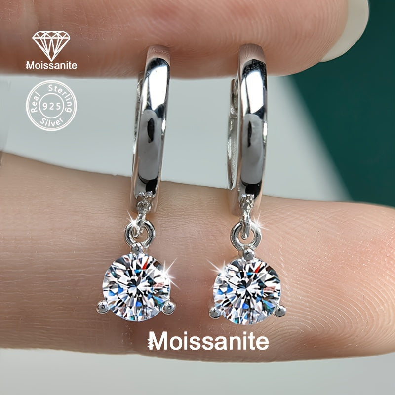 Luxurious and versatile, these 925 Silver earrings feature 1 Carat White Moissanite stones, making them the perfect gift for birthdays, Valentine's Day, Christmas, Halloween, Thanksgiving, New Year, or any special occasion. They are also great for daily