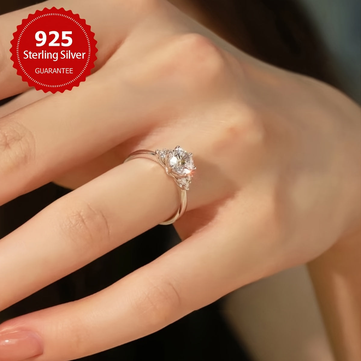 This elegant Moissanite engagement ring features a 1CT stone set in 925 sterling silver, with a silvery gram weight ranging from 5-9 yards. The shining Moissanite wings add a touch of luxury, making it the perfect gift for a loved one on Valentine's Day