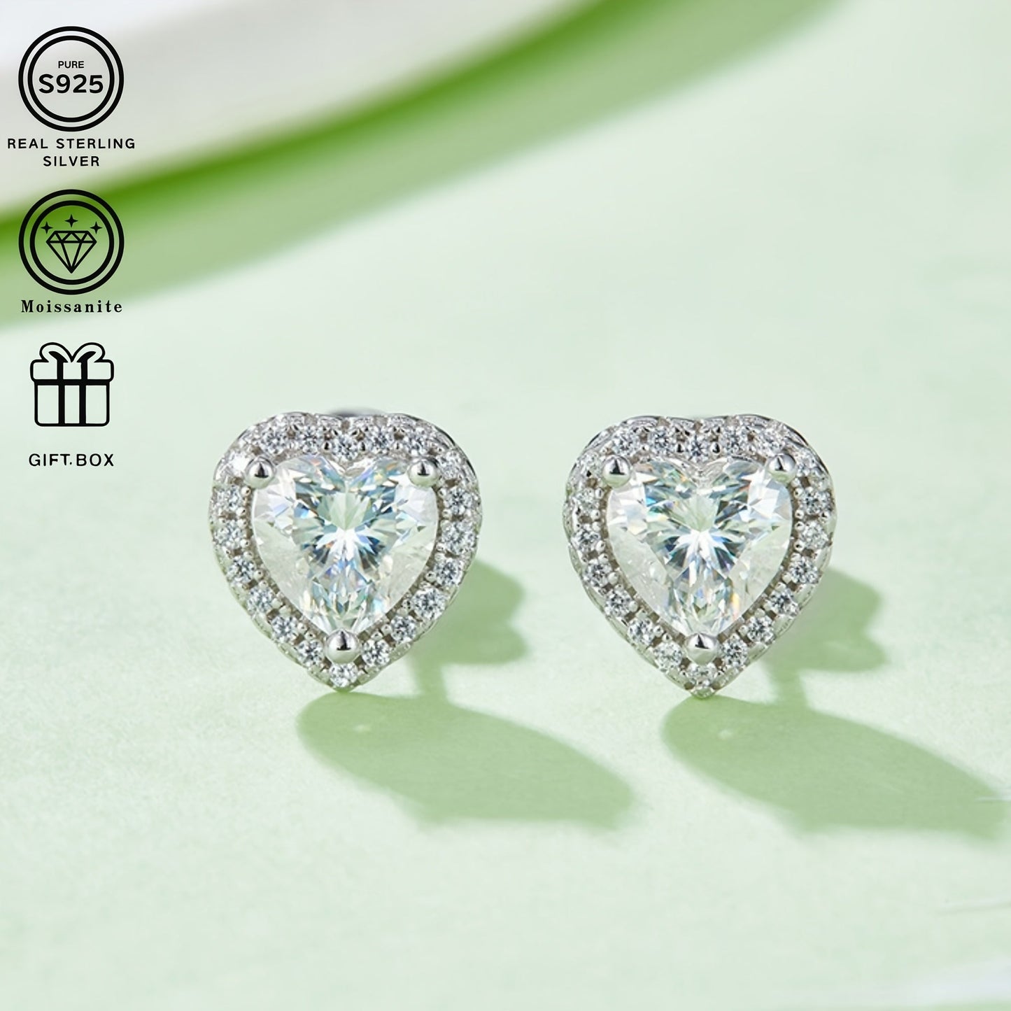 These elegant and luxurious S925 Silver Light Luxury Heart Platinum-Plated 2 Carat Moissanite Pendant Earrings are perfect for daily wear or special occasions. With a total weight of approximately 2.88g/1.58g, these earrings make a beautiful gift for