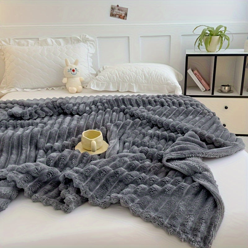 Machine washable, this luxurious double-sided throw blanket is made of faux rabbit fur that is warm, soft, and cozy. Perfect for naps, office use, outdoor camping, or on the sofa. The soft striped design adds a touch of elegance, making it a perfect gift