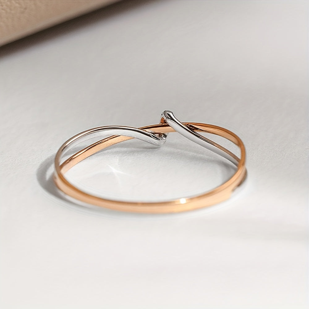 Rose Gold Double Knot Ring - This exquisite ring features elegant rose gold intertwined in a double knot design, crafted with 925 sterling silver and embellished with sparkling cubic zirconia stones. Perfect for celebrating your anniversary, this 2.0g