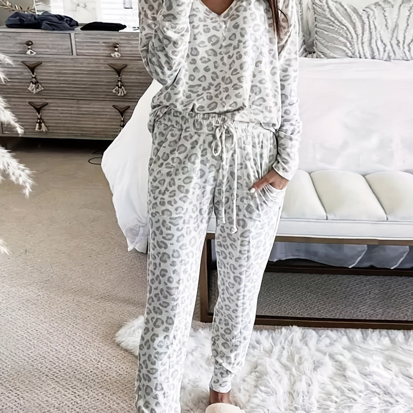 Leopard print lounge set with V-neck top and lace-up pants for women's loungewear and sleepwear.