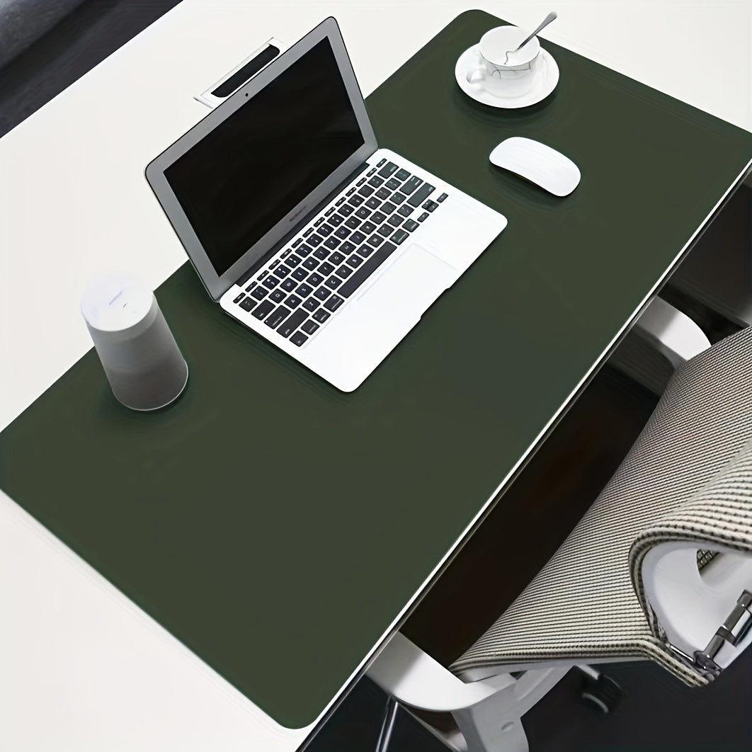 Waterproof faux leather desk pad with anti-slip surface for office and home use. Measures 59.99 x 32.99 cm. Rectangular mouse pad for workspace protection. Sleek and easy to clean design.