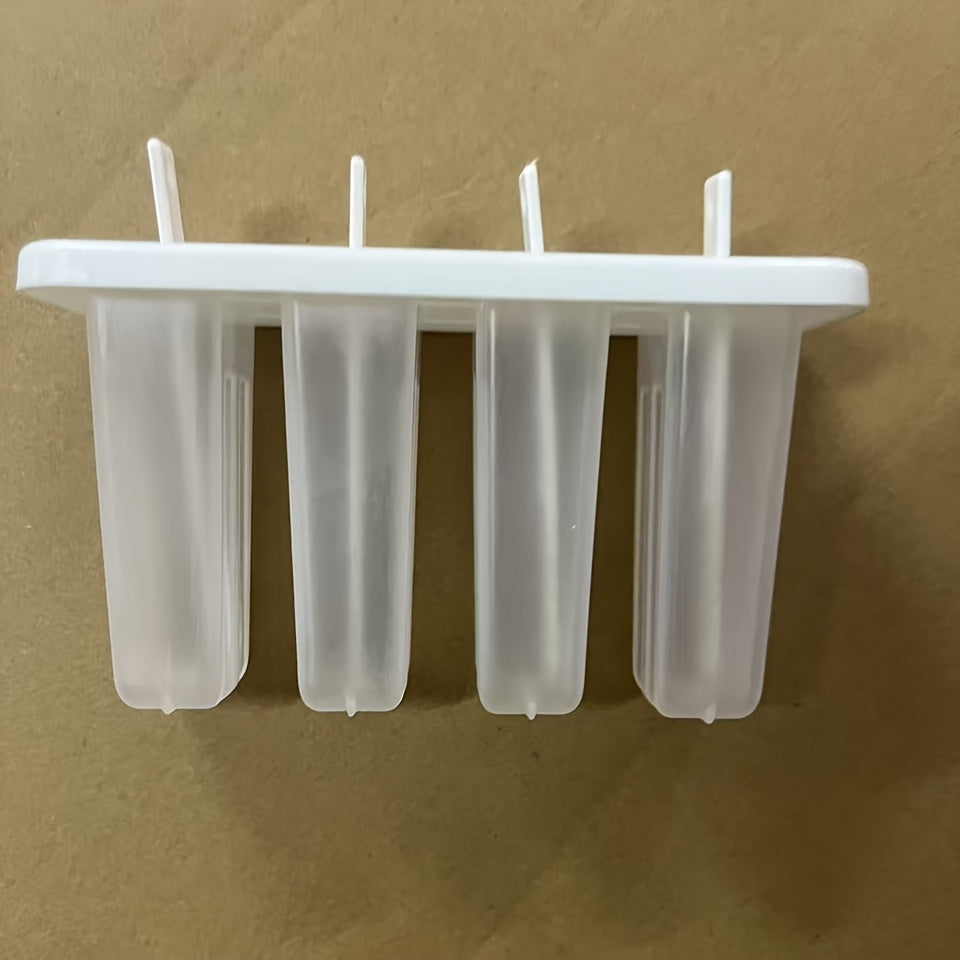 Set of 4 reusable popsicle molds with lids for making homemade frozen treats.