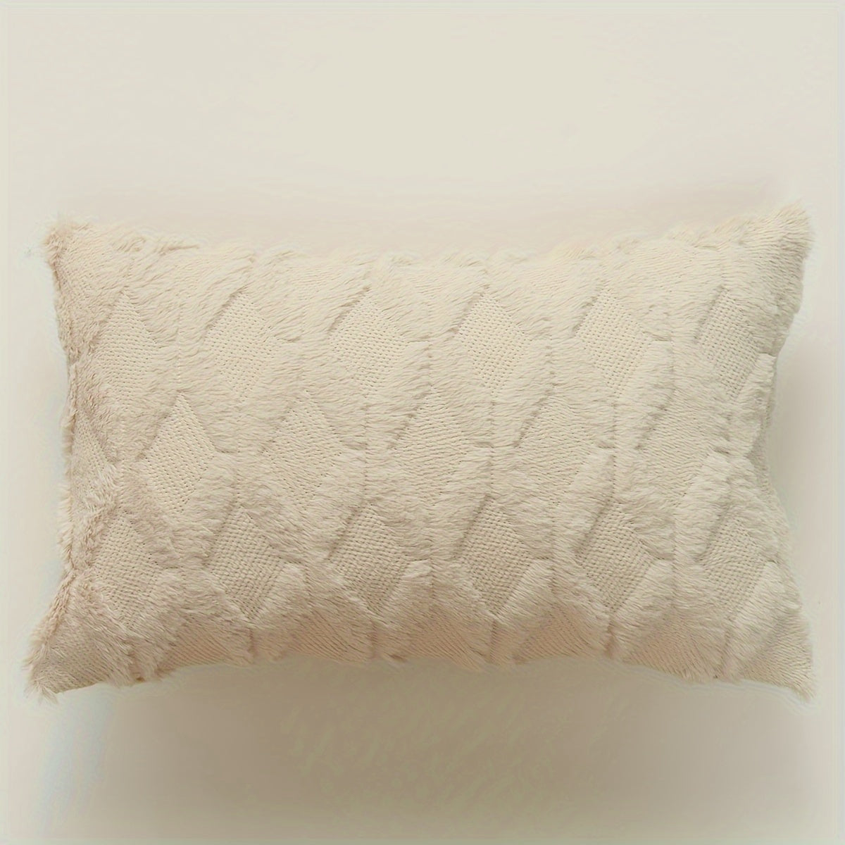 Indulge in the luxurious comfort of our Ultra-Soft Plush Diamond Quilted Throw Pillow Cover. Featuring a solid color back and a zip closure for easy removal, this cozy and comfortable cover is the perfect addition to your living room, bedroom, or sofa