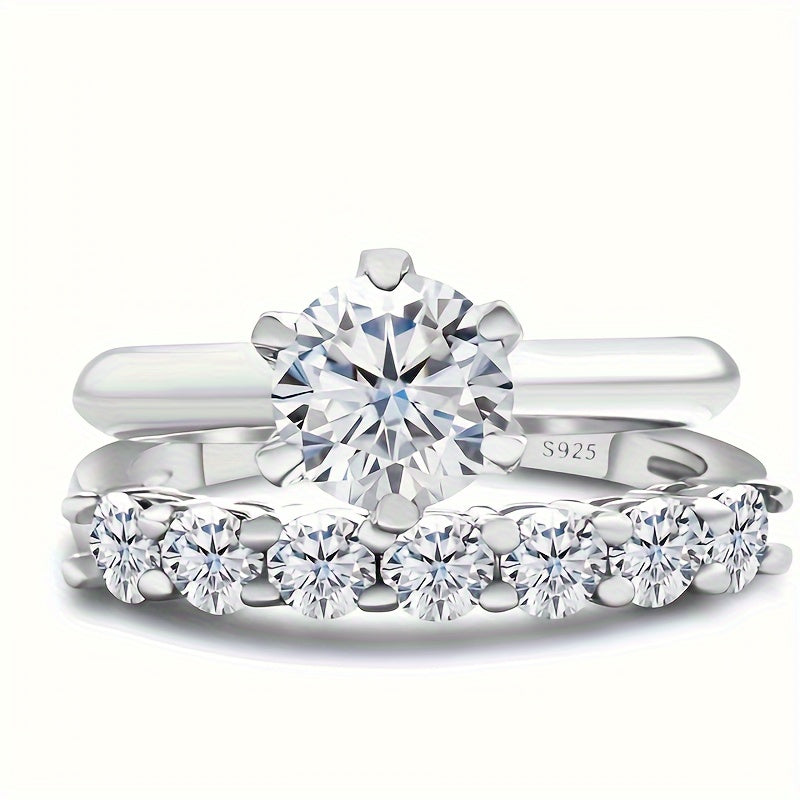 The GEMS LADY Bridal Ring Set features a stunning 1.7CT total weight, crafted in S925 sterling silver with a classic French-style design. The set includes 6-prong Moissanite round cut stackable anniversary rings, making it the perfect romantic Christmas