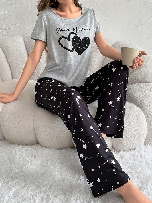 Women's pajama set featuring heart, star, and letter print, with round neck top and elastic pants.