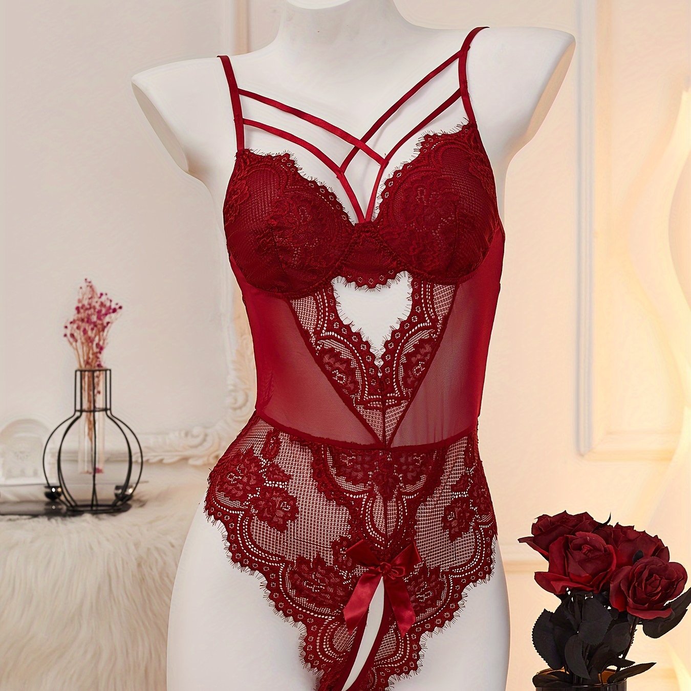 Red lace velvet teddy with heart cut-out, open crotch, and strappy back for women's lingerie.