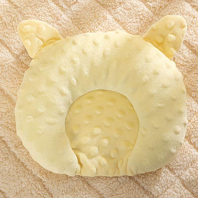 Small dog sleep pad with u-shaped cartoon design. Made of polyester fleece with solid pattern, perfect for toy breeds.