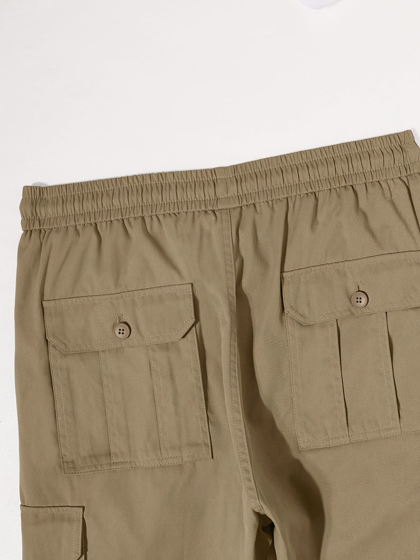 Men's classic solid color cargo pants with multiple pockets, loose fit, and drawstring waist. Perfect for outdoor activities, fishing, and streetwear.