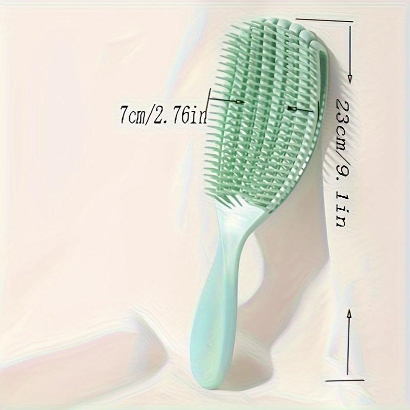 Wet and dry use shell comb with large curved fluffy style for smooth, knot-free hair. Features eight-claw massage design.