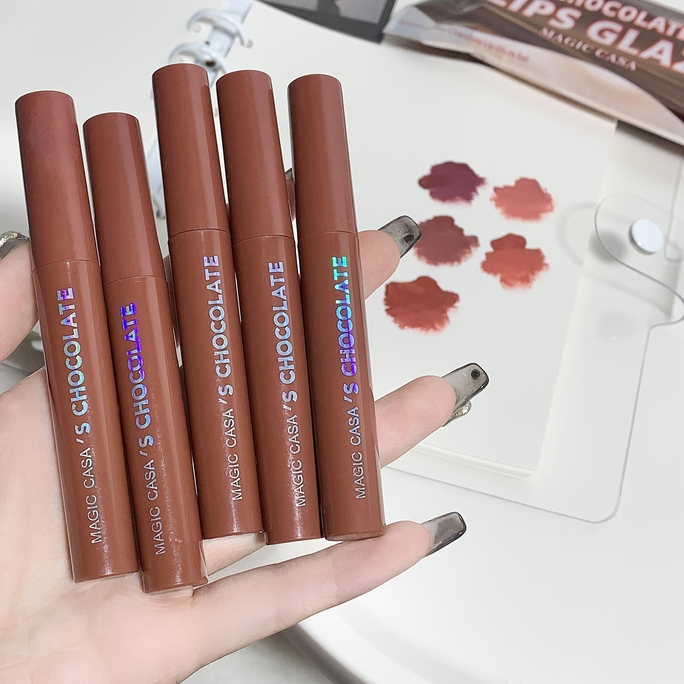 Get a 5-piece set of Lava Chocolate Lip Glaze that moisturizes and hydrates lips while giving a matte finish. This waterproof and long-lasting formula is perfect for gifting to girls.