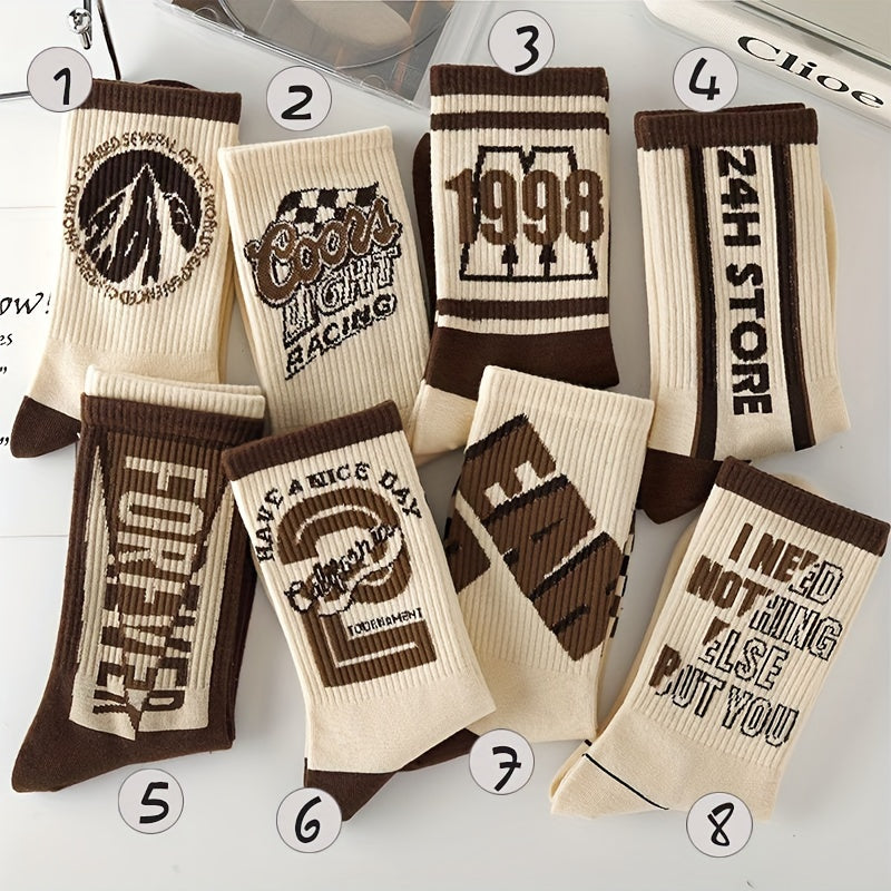 4 pairs of retro letter pattern crew socks for men, ideal for outdoor activities.