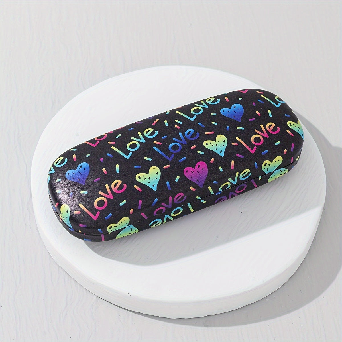 Protective storage box for glasses and sunglasses featuring colorful printed designs and fun patterns, designed specifically for ladies. The hard shell case ensures your eyewear stays safe and stylish.