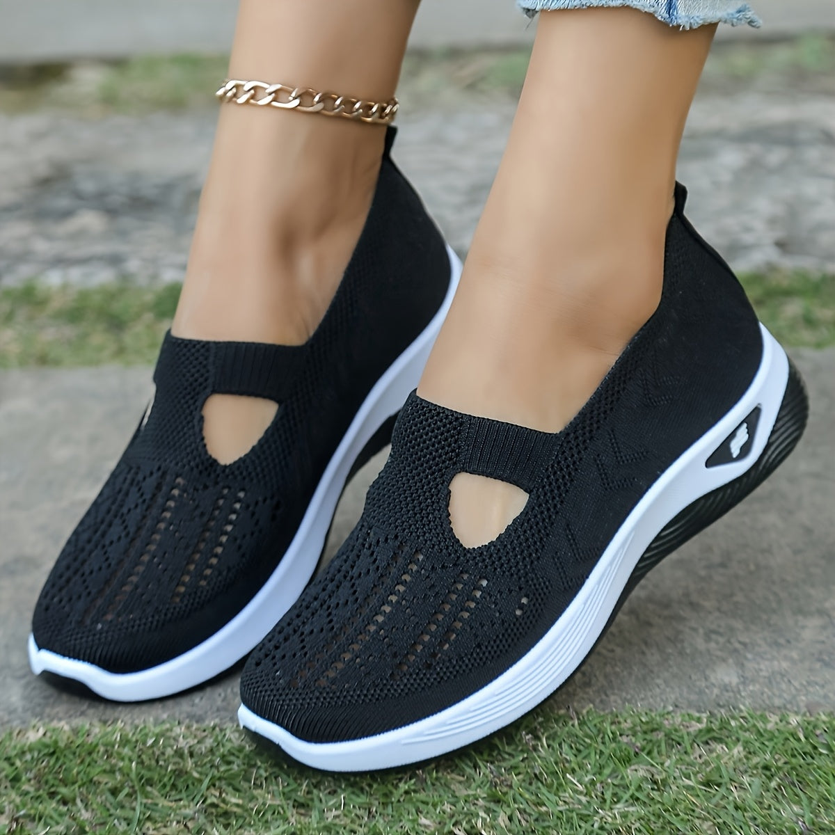 Breathable mesh slip-on sneakers with PVC sole, fabric insole, and lining for stability and comfort. Perfect for casual outdoor wear in spring and summer. Features cut-out patterns and