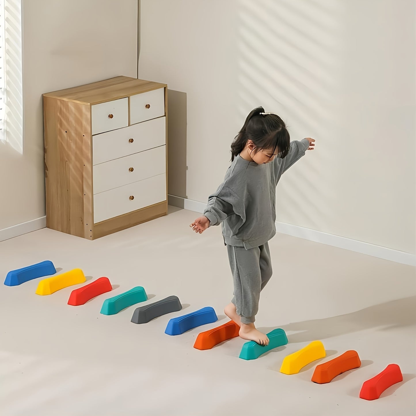 8-piece set of Stepping Stones and Balance Blocks in red, green, blue, and yellow, made of durable PP material for indoor/outdoor use. Perfect for youngsters' fitness and sensory play.