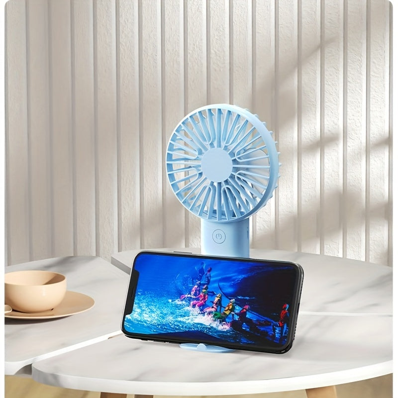 Portable USB Mini Fan in White, Blue, and Pink with Touch Control - Perfect for Office, Travel, Camping, and Picnics. Wearable design makes it convenient to carry around. Rechargeable with Built-in Lithium Battery for on-the-go cooling. Get the Mini Fan