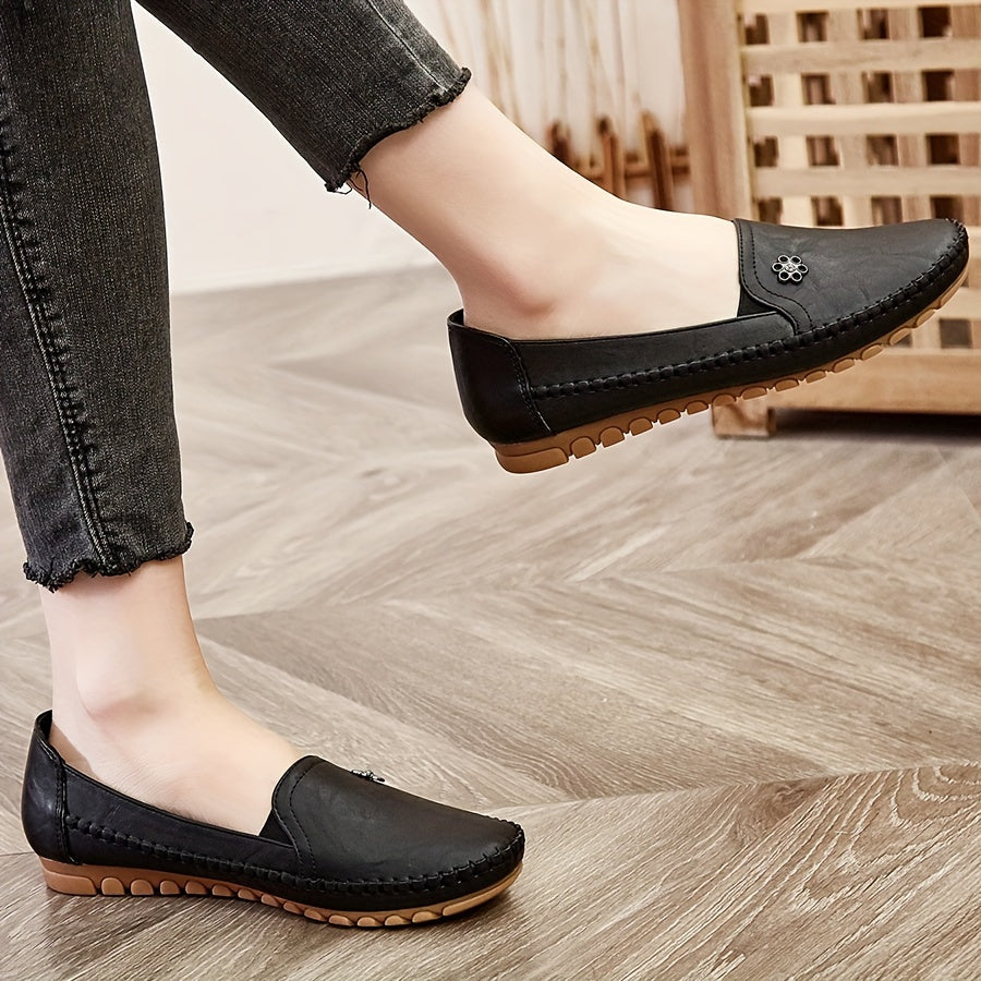 Stylish, comfortable women's loafers with flower buckle detail and soft sole for daily wear.