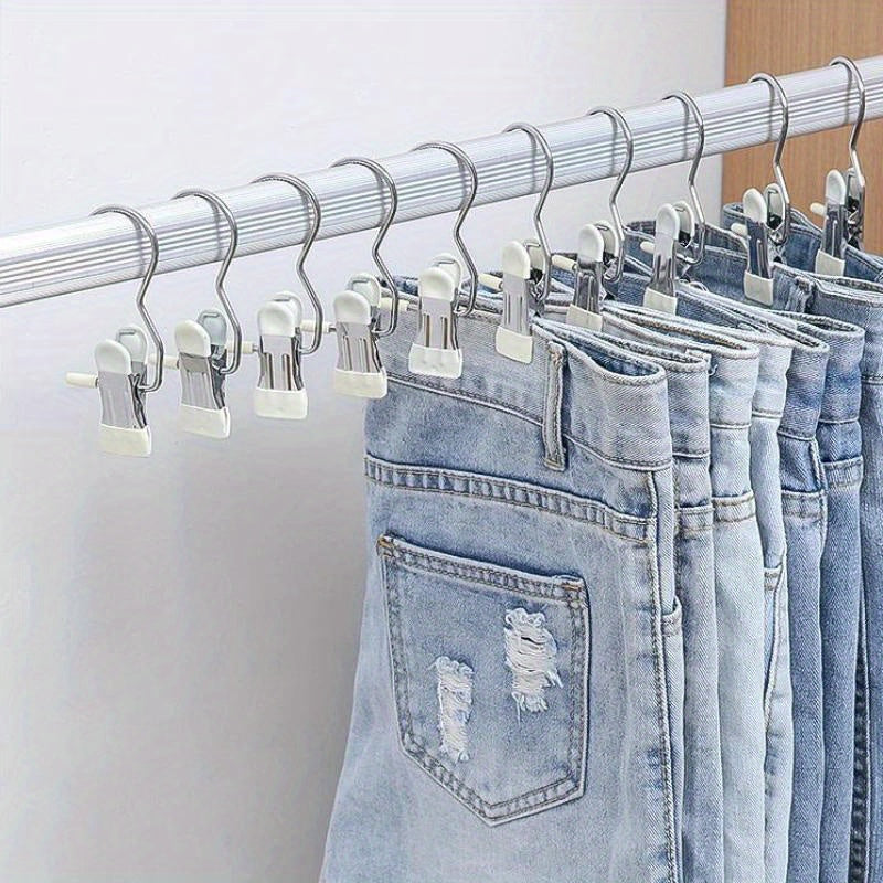 A set of 10 durable stainless steel clothespins with hooks, perfect for securely hanging laundry. These portable clothes clips are ideal for organizing your wardrobe and finishing racks. Essential household goods for keeping your clothes neat and tidy.