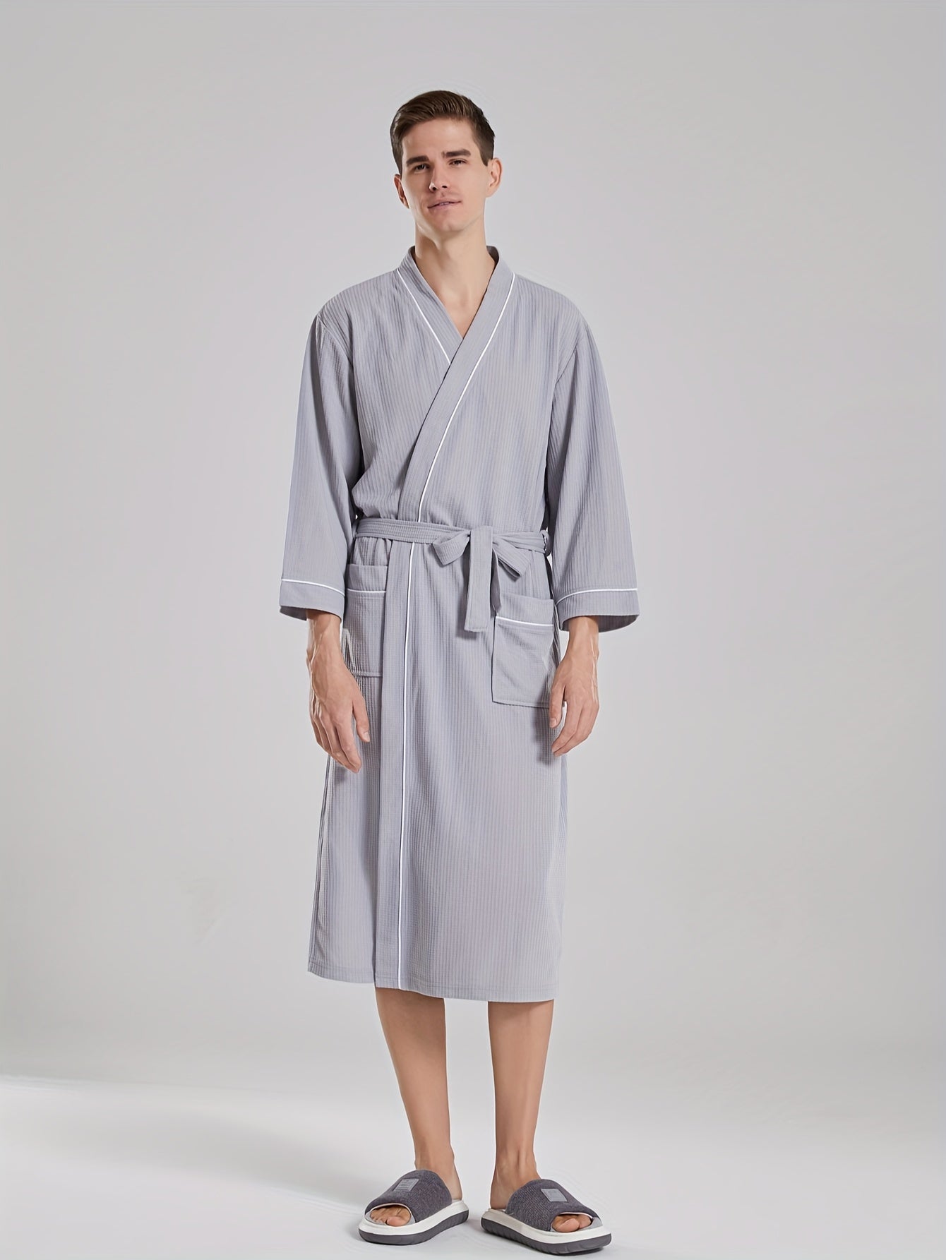 Unisex Japanese-style bathrobe with waffle weave, pockets, and belt for all-season comfort.