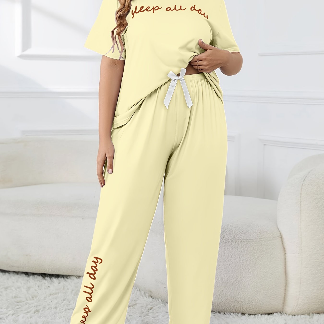 Cute plus-size pajama set with printed top and casual pants.