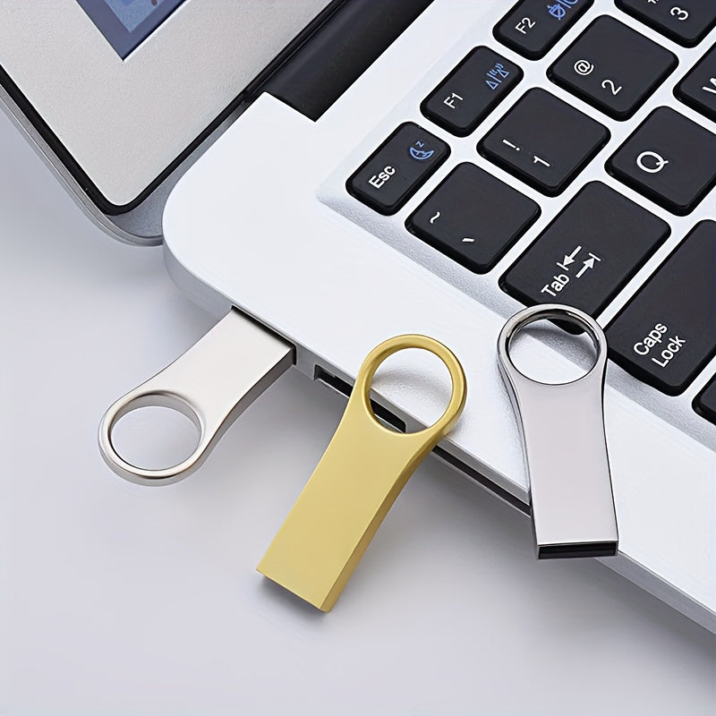 Metal flash drive with capacities from 8GB to 110GB, high-speed USB 2.0, keychain for easy transportation, ideal for storing photos, videos, and files.