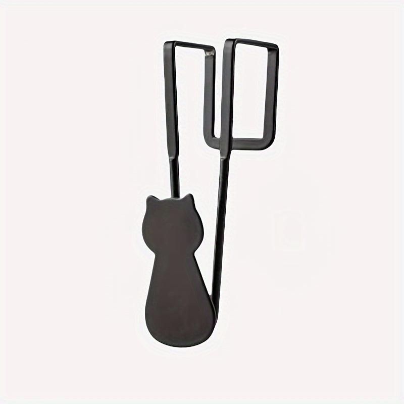 Stylish cat-shaped over-the-door hook for versatile use in home decor. Made of metal with a paint finish for easy installation and hanging coats, hats, towels, and keys in bathroom, kitchen, wardrobe, and utility areas.