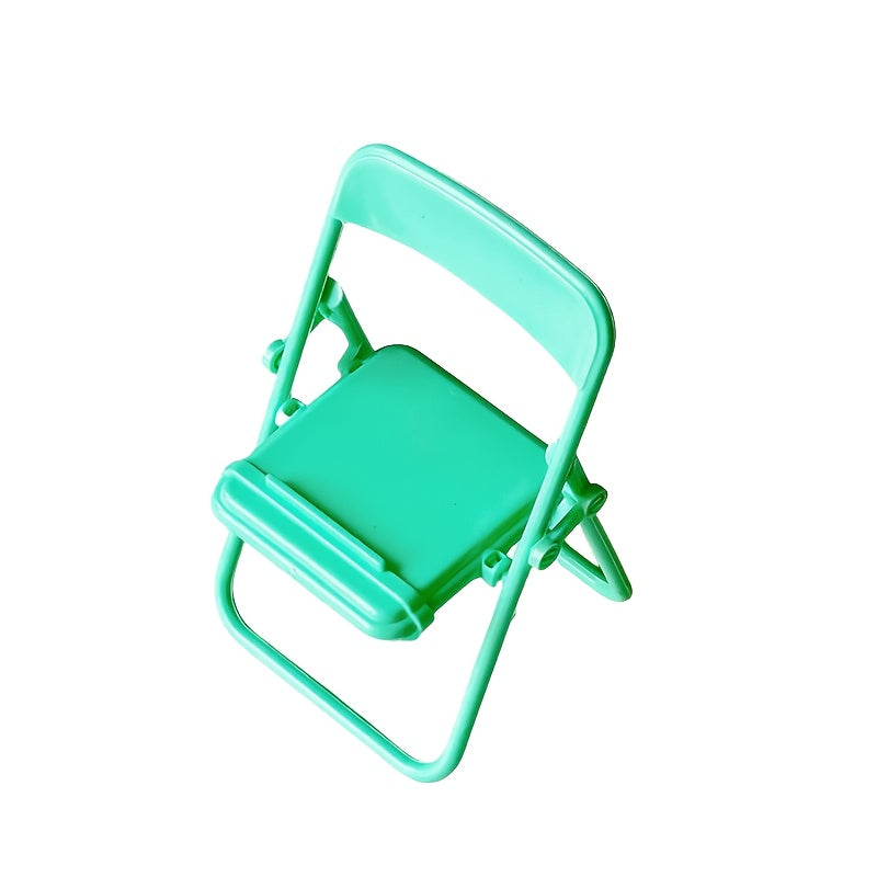 Modern collapsible tiny chair made of plastic, perfect for your desk, doubles as a portable phone stand, no need for assembly, does not require electricity.