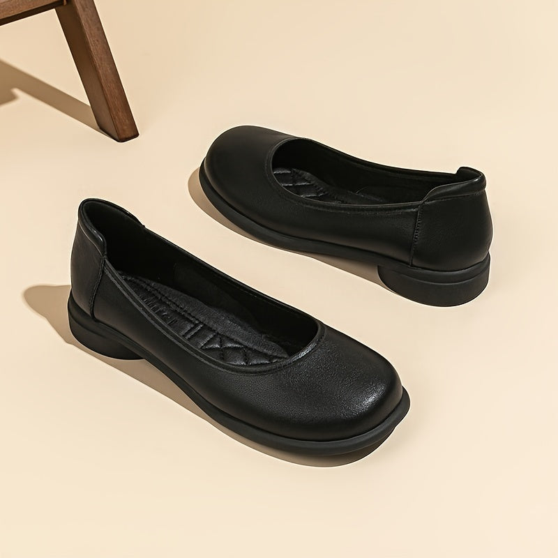 Women's black slip-on flats with an elegant design, comfortable round toe, soft and lightweight sole, and a microfiber cover. Perfect for professional attire with a sleek and cute look.