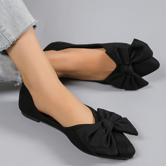 All-season slip-on flats for women with bow detail, fabric upper, rubber sole, and man-made insole. Versatile and stylish for work or casual wear.