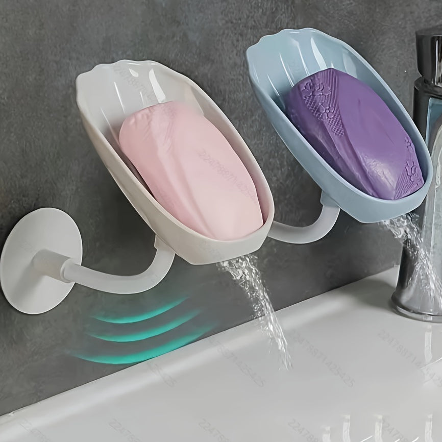 Wall-mounted, self-draining soap dish with lotus leaf design, for bathroom or kitchen. No-hole installation, plastic material.