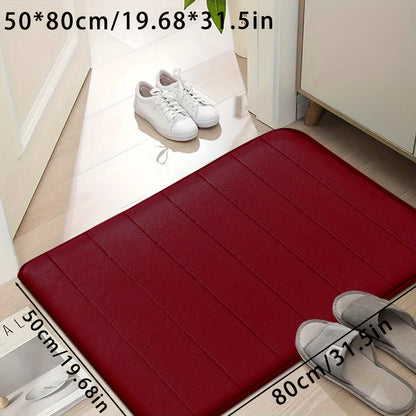 Set of memory foam bath mats, featuring ultra-soft and absorbent material with a non-slip backing. Ideal for use in the bathroom, shower, laundry room, or outdoor entrance. Made of durable polyester that is easy to clean in the washing machine. Can also