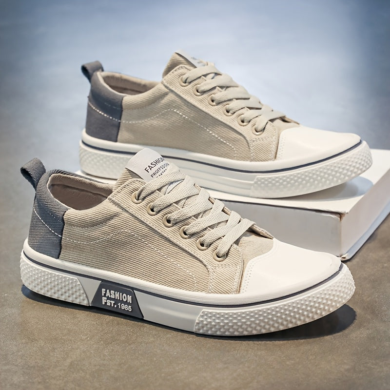 Breathable men's canvas sneakers with low-top lace-up design for outdoor activities.