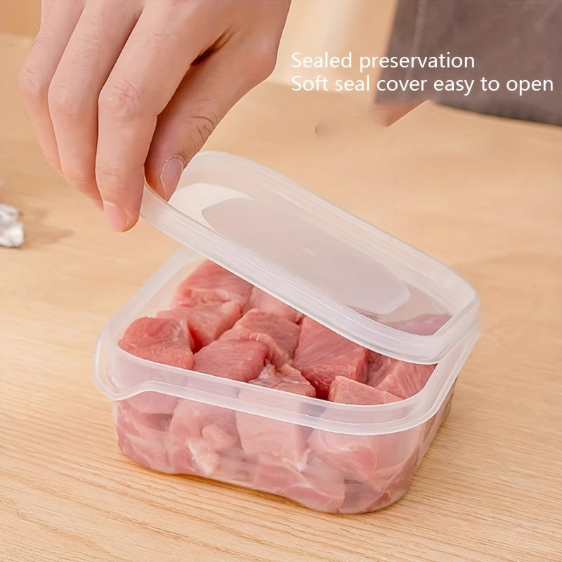 Refrigerator storage box for vegetables, fruits, jelly, meat, and various ingredients. This box helps to keep your food fresh and can be used in the microwave.