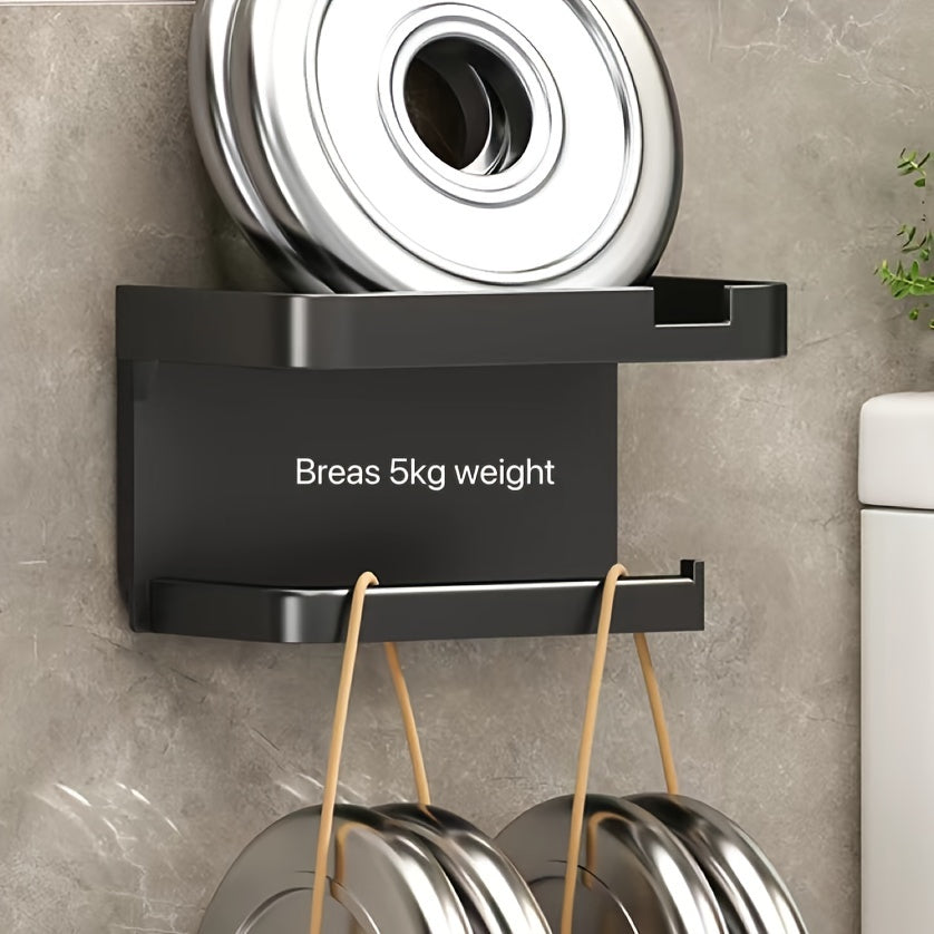 Wall-mounted toilet paper holder with shelf and phone holder, made of plastic, self-adhesive, no drilling required.