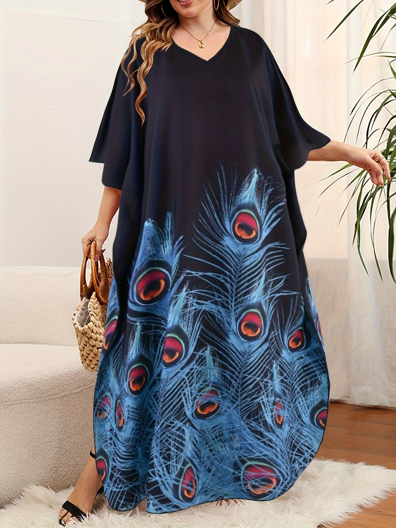 Plus size kaftan dress for women with V-neck print and short batwing sleeves. Loose fit with long length, slit, and made from polyester and elastane. Ideal for spring, summer, and fall