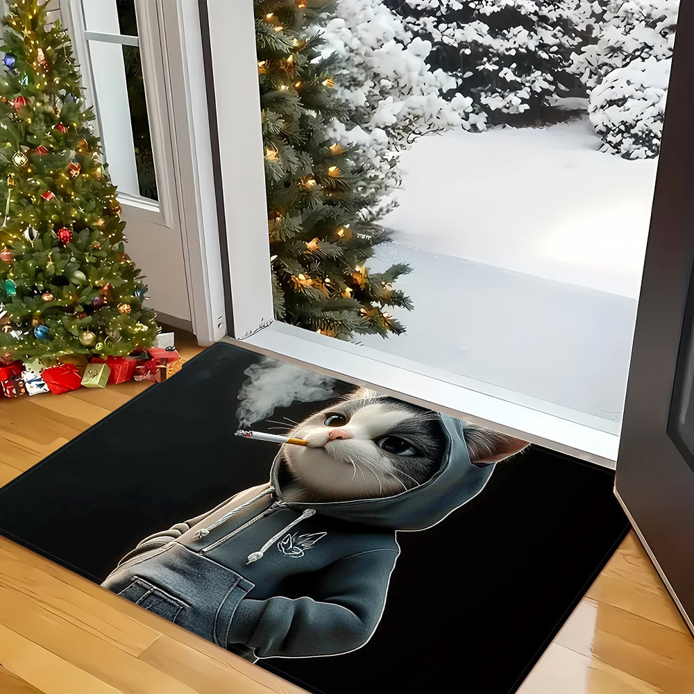 Small, machine washable doormat featuring a whimsical cat in a hoodie design. Made of durable polyester, this quick-dry mat is ideal for kitchen, bathroom, bedroom, and outdoor decor.