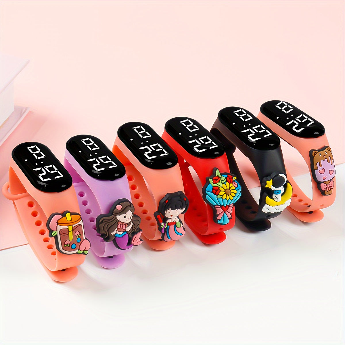 6 cute cartoon LED wristwatches for youngsters in vibrant colors. Large display, battery-operated with TPU strap. Fun and educational for students. Not waterproof.