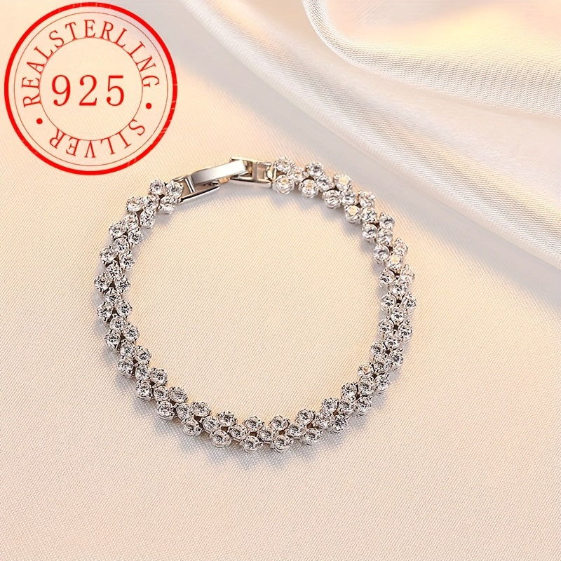 This elegant tennis bracelet is made of high-quality 925 sterling silver and features synthetic Moissanite stones. With its classic luxury design, this unisex bracelet is the perfect accessory for daily wear or gift-giving. It is also suitable for all