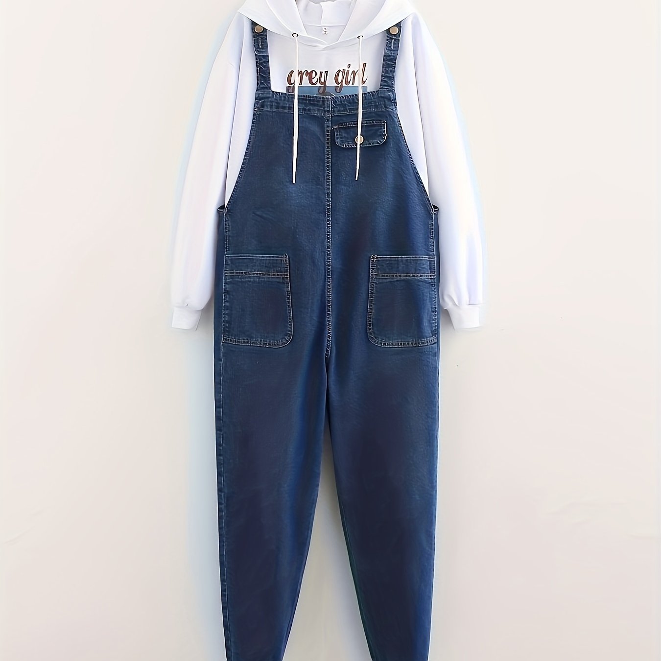 Women's casual style denim overalls in light washed blue, loose fit, also available in denim jeans & clothing.