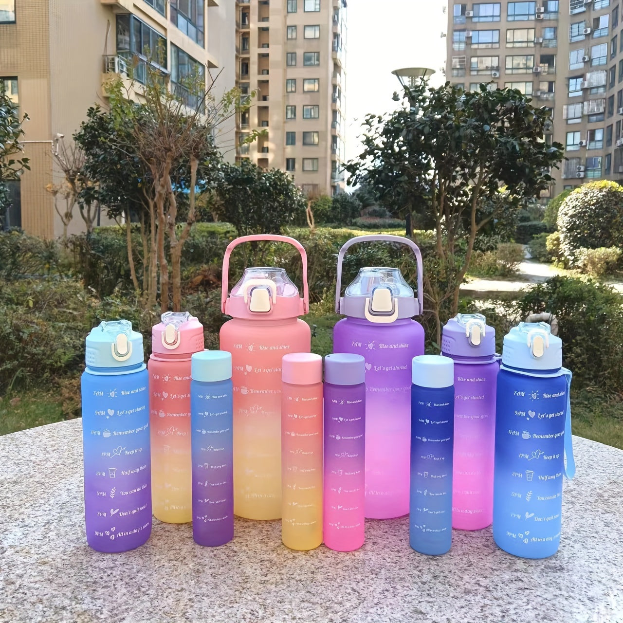 Motivational water bottle set with three sizes (300ml, 700ml, 2L) for sports and outdoor activities. Great for camping, hiking, and fitness. Perfect for summer and also makes a great birthday gift.