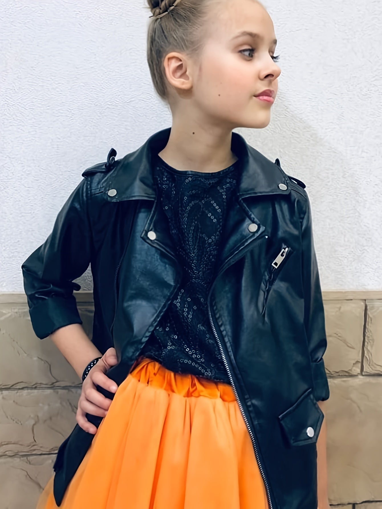 Black PU leather jacket for girls, biker style, zipper closure, suitable for spring and autumn streetwear.