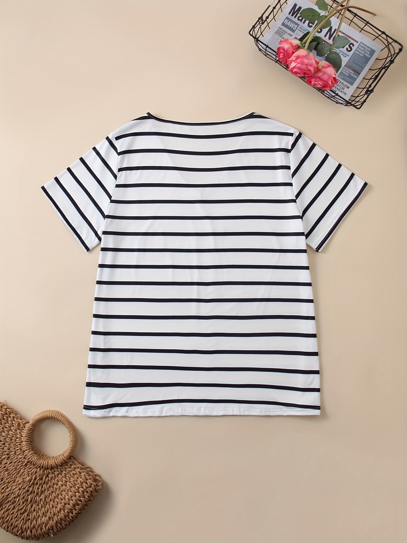 Women's plus size striped V-neck t-shirt with random print design, ideal for spring, summer, and autumn.