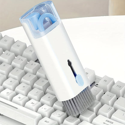 Multipurpose cleaning kit for digital devices including keyboard, laptop, earphone ports, and mobile phone. Includes soft bristle brush, spray cleaner, and microfiber tip.